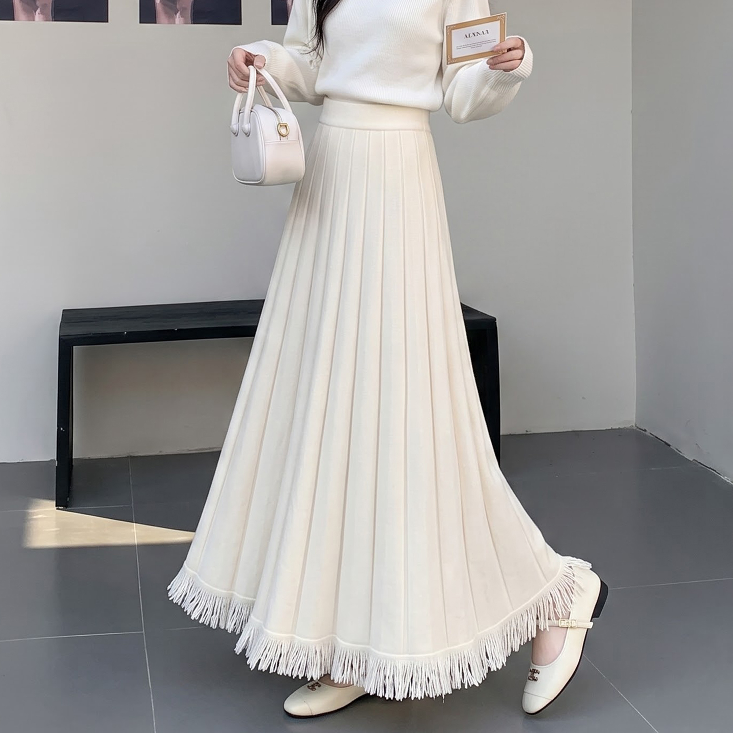 Women's Knit Pleated High Waist A-Line Maxi Skirt with Tassel Detail - Image 3